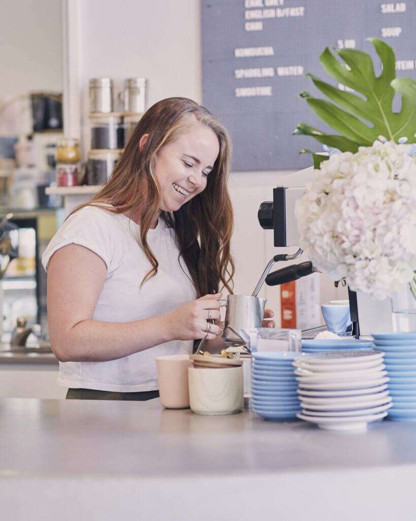 woman making a coffee