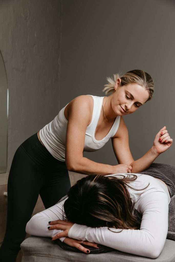 woman receiving myotherapy treatment